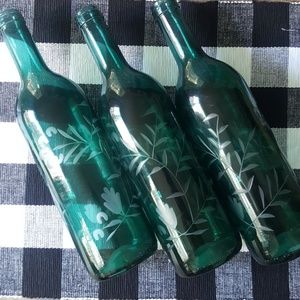 Set of 3 blue etched glass bottles